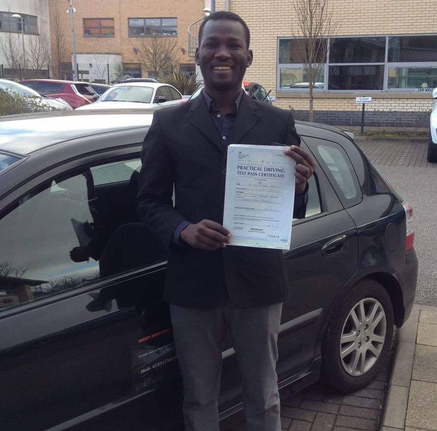 Image of a learner driver showing their test certificate